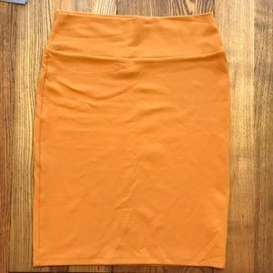 Mustard-colored LuLaRoe Cassie skirt - size L